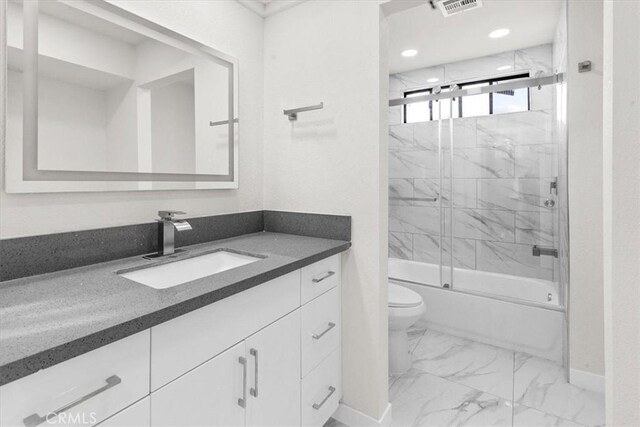 3190 E Vincentia Rd, Palm Springs, CA 92262 - full bathroom featuring marble finish floors, toilet, baseboards, vanity, and enclosed tub / shower combo