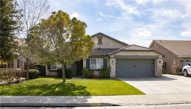 view of front of property featuring a tile roof, stucco siding, concrete driveway, a garage, and a front lawn