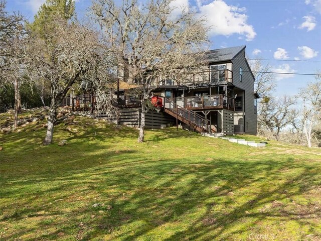8160 Los Osos Rd, Atascadero, CA 93422 - rear view of house with a wooden deck, a lawn, and stairway