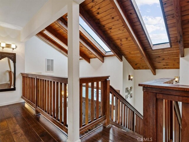 8160 Los Osos Rd, Atascadero, CA 93422 - stairs featuring wood ceiling, hardwood / wood-style flooring, and vaulted ceiling with skylight