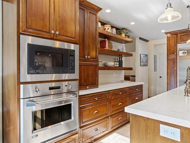8160 Los Osos Rd, Atascadero, CA 93422 - kitchen featuring open shelves, built in appliances, light stone countertops, and brown cabinets