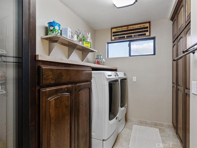 8160 Los Osos Rd, Atascadero, CA 93422 - laundry room with washing machine and clothes dryer, baseboards, laundry area, and light tile patterned flooring