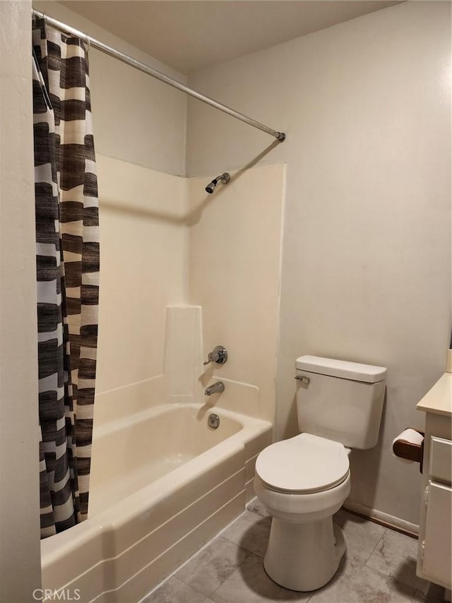 full bathroom featuring vanity, shower / bath combo with shower curtain, and toilet