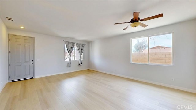 12912 Amador St, Victorville, CA 92392 - unfurnished room featuring visible vents, a ceiling fan, recessed lighting, light wood-style floors, and baseboards
