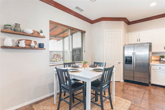 dining space with light tile patterned floors, baseboards, visible vents, crown molding, and recessed lighting