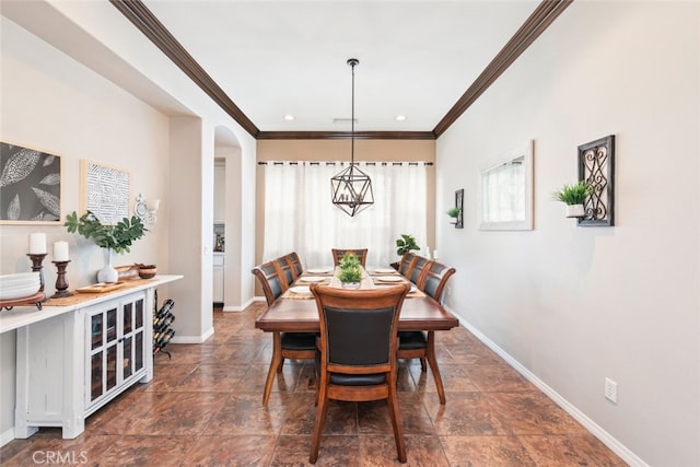 dining space featuring ornamental molding, recessed lighting, and baseboards