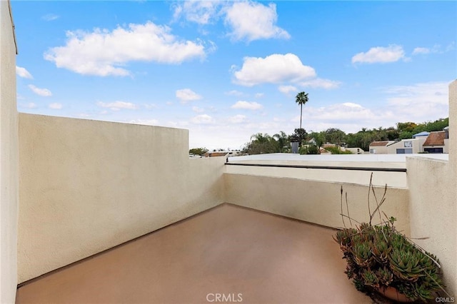 view of patio with a balcony