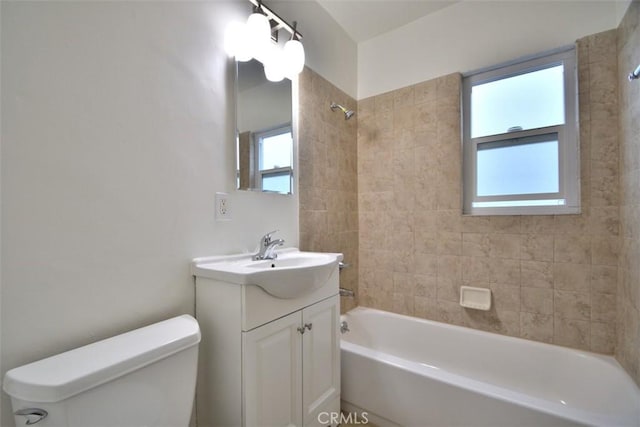 full bathroom featuring toilet, vanity, and shower / bathtub combination