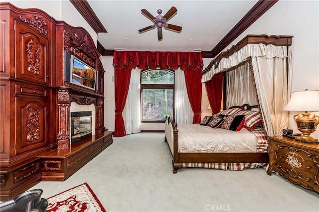 293 Fairway Dr, Lake Arrowhead, CA 92352 - carpeted bedroom featuring a ceiling fan, crown molding, and a fireplace