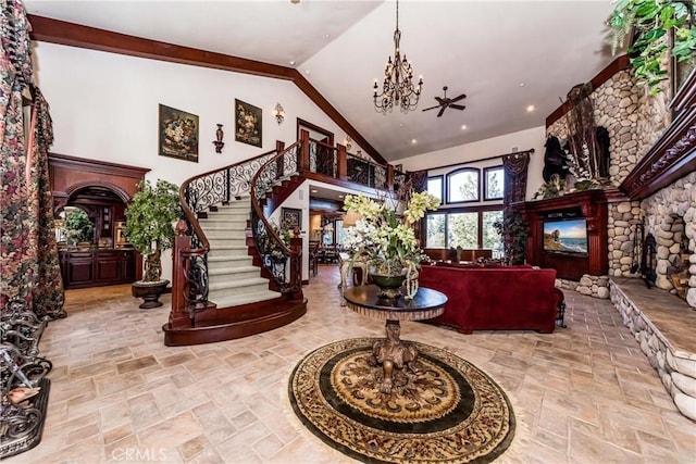 293 Fairway Dr, Lake Arrowhead, CA 92352 - entrance foyer with high vaulted ceiling, stairway, a chandelier, stone finish floor, and recessed lighting