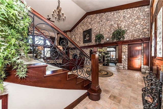 293 Fairway Dr, Lake Arrowhead, CA 92352 - foyer entrance featuring a chandelier, stone tile flooring, high vaulted ceiling, and stairs