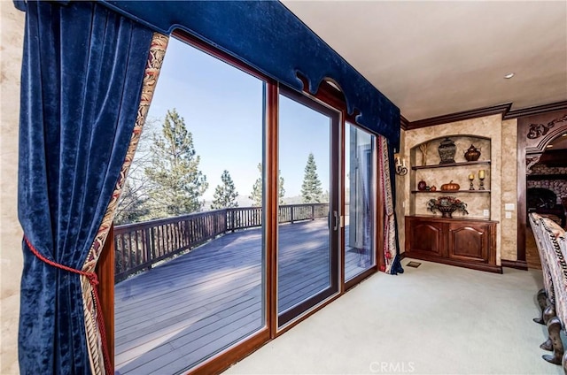 293 Fairway Dr, Lake Arrowhead, CA 92352 - doorway with built in features, carpet floors, and ornamental molding