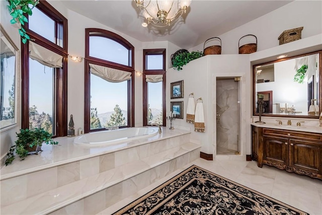 293 Fairway Dr, Lake Arrowhead, CA 92352 - bathroom featuring vanity, a stall shower, a chandelier, and a bath