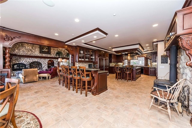 293 Fairway Dr, Lake Arrowhead, CA 92352 - dining area with recessed lighting, bar, and stone finish flooring