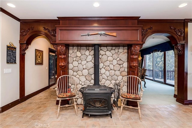 293 Fairway Dr, Lake Arrowhead, CA 92352 - interior details featuring baseboards, ornamental molding, recessed lighting, arched walkways, and a wood stove