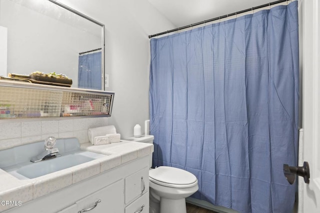 full bathroom with a shower with curtain, wood finished floors, vanity, and toilet
