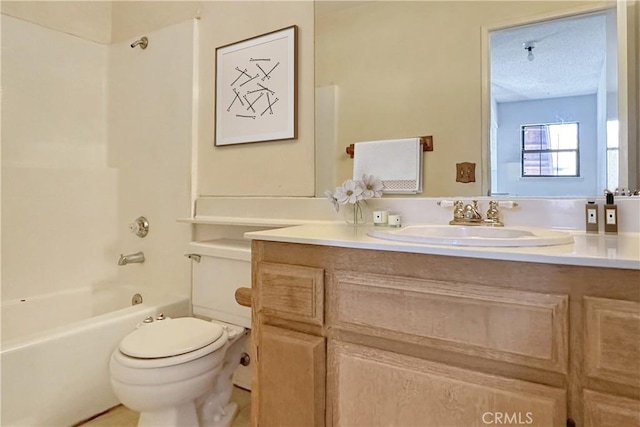 full bath with shower / bathing tub combination, vanity, toilet, and a textured ceiling