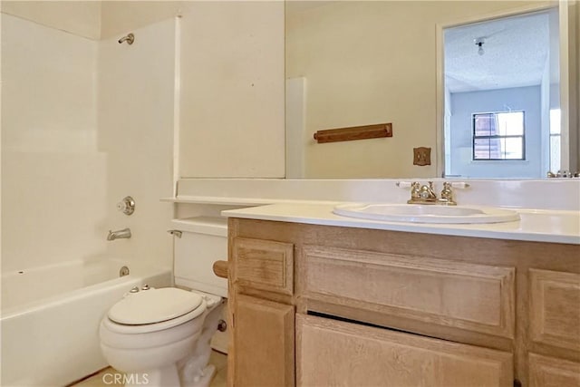 bathroom featuring shower / washtub combination, a textured ceiling, toilet, and vanity