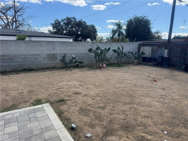 view of yard with fence