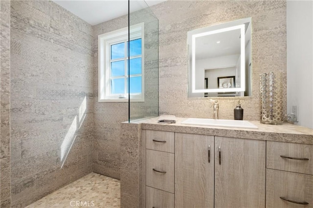 504 Evening Star Ln, Newport Beach, CA 92660 - full bathroom with a walk in shower, tasteful backsplash, vanity, and tile walls