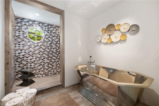 504 Evening Star Ln, Newport Beach, CA 92660 - bathroom featuring a freestanding bath, tiled shower, and wood finished floors