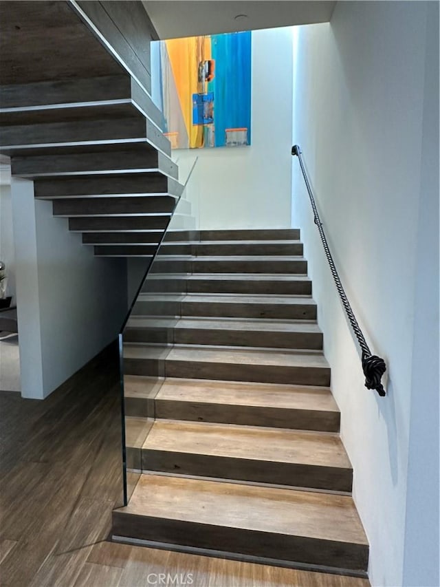 504 Evening Star Ln, Newport Beach, CA 92660 - staircase featuring wood finished floors