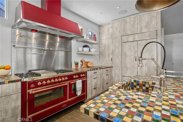 504 Evening Star Ln, Newport Beach, CA 92660 - kitchen with tile countertops, open shelves, wall chimney range hood, wood finished floors, and double oven range