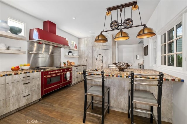504 Evening Star Ln, Newport Beach, CA 92660 - kitchen with range hood, a breakfast bar, open shelves, dark wood-type flooring, and a sink