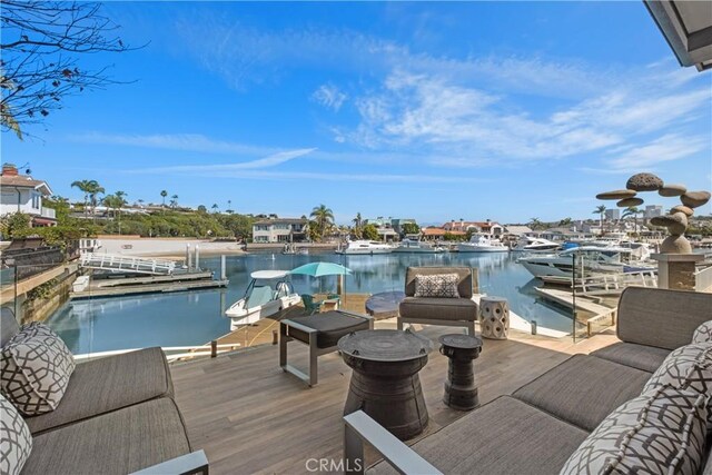 504 Evening Star Ln, Newport Beach, CA 92660 - wooden terrace featuring a water view and a floating dock