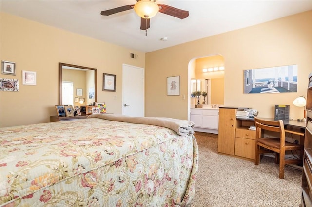 25214 Steinbeck Ave Unit G, Stevenson Ranch, CA 91381 - bedroom with a ceiling fan, visible vents, light colored carpet, and ensuite bath