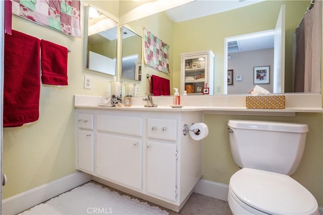 25214 Steinbeck Ave Unit G, Stevenson Ranch, CA 91381 - full bath featuring toilet, visible vents, vanity, and baseboards