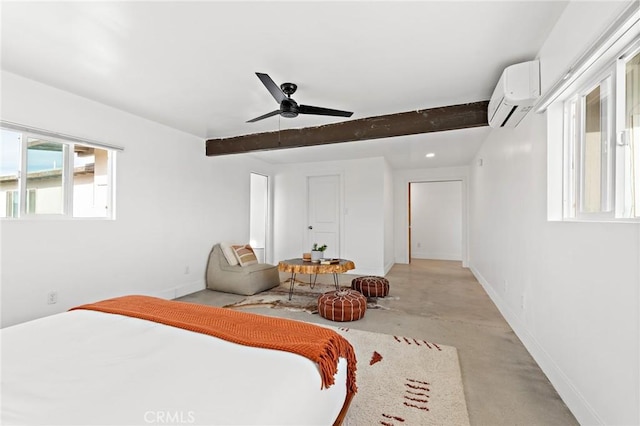 bedroom with finished concrete flooring, a wall mounted AC, beam ceiling, and baseboards