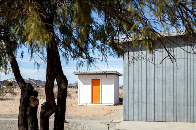 view of shed with a mountain view