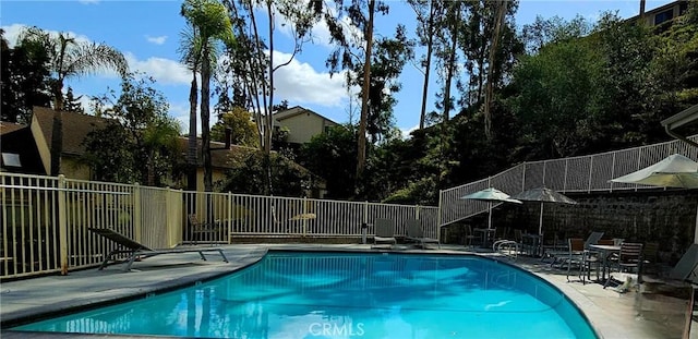 5440 Baltimore Dr Unit 144, La Mesa, CA 91942 - community pool featuring a patio and fence