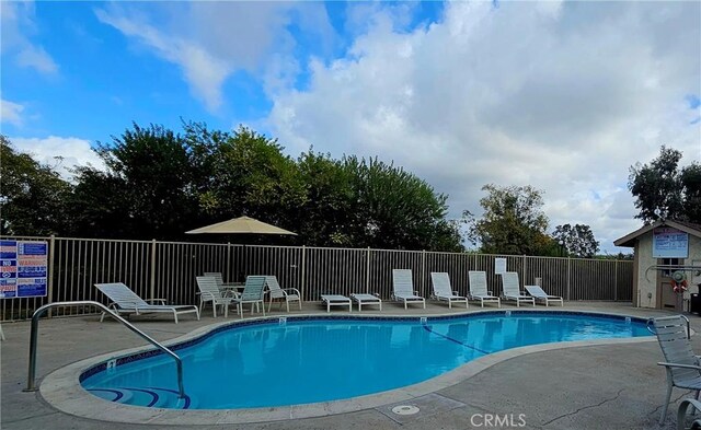 5440 Baltimore Dr Unit 144, La Mesa, CA 91942 - community pool with a patio and fence