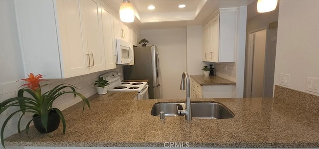 5440 Baltimore Dr Unit 144, La Mesa, CA 91942 - kitchen featuring white appliances, a sink, decorative backsplash, stone countertops, and recessed lighting