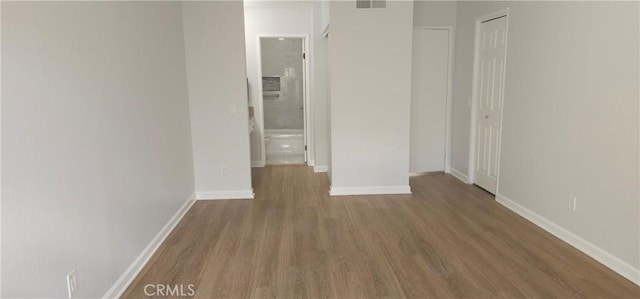 5440 Baltimore Dr Unit 144, La Mesa, CA 91942 - empty room with wood finished floors and baseboards