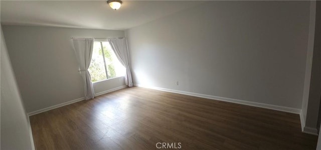 5440 Baltimore Dr Unit 144, La Mesa, CA 91942 - spare room featuring wood finished floors and baseboards