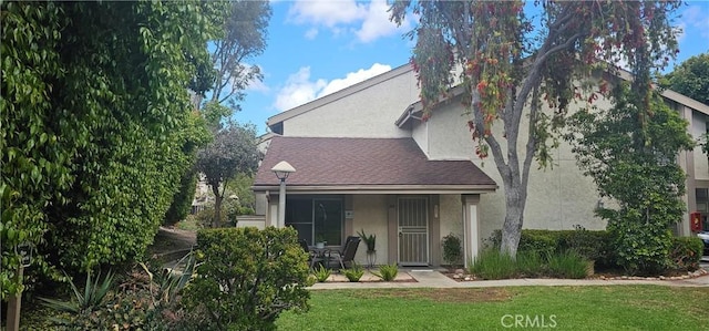 5440 Baltimore Dr Unit 144, La Mesa, CA 91942 - view of front facade featuring stucco siding and a front yard