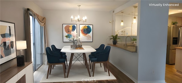 5440 Baltimore Dr Unit 144, La Mesa, CA 91942 - dining room with wood finished floors, a chandelier, and baseboards