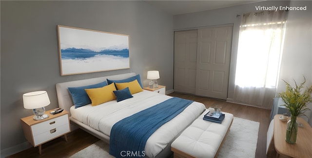 5440 Baltimore Dr Unit 144, La Mesa, CA 91942 - bedroom featuring wood finished floors, baseboards, multiple windows, and a closet
