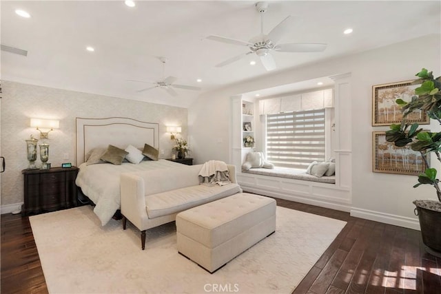 bedroom featuring visible vents, baseboards, dark wood-style flooring, and recessed lighting