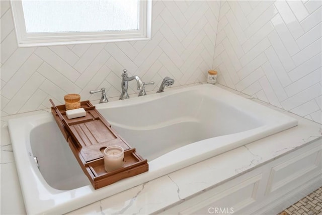 full bathroom featuring a tub to relax in