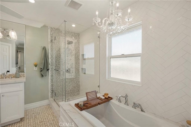 bathroom featuring a bath, vanity, visible vents, and a shower stall