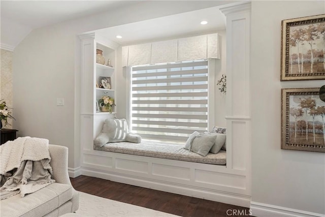 sitting room featuring recessed lighting, ornate columns, dark wood finished floors, and baseboards