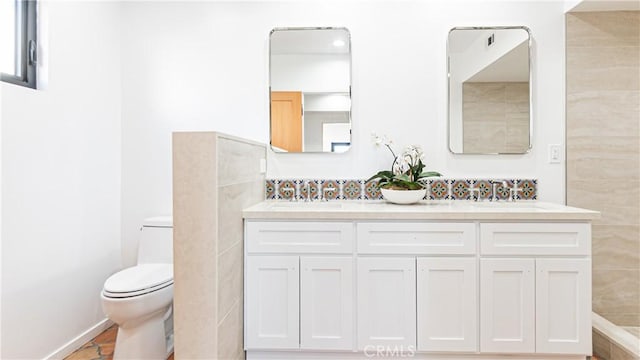 6652 Hough St, Los Angeles, CA 90042 - full bathroom featuring a sink, toilet, and double vanity