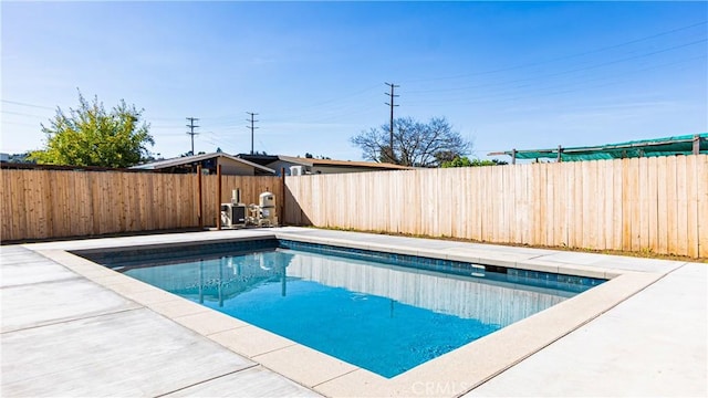 6652 Hough St, Los Angeles, CA 90042 - view of pool with a fenced in pool, a patio, a fenced backyard, and cooling unit