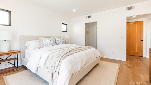 6652 Hough St, Los Angeles, CA 90042 - bedroom with light wood-type flooring, baseboards, visible vents, and recessed lighting