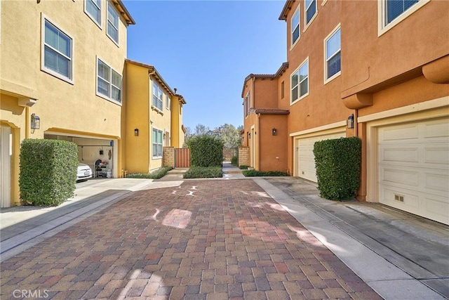 view of road with sidewalks and a residential view