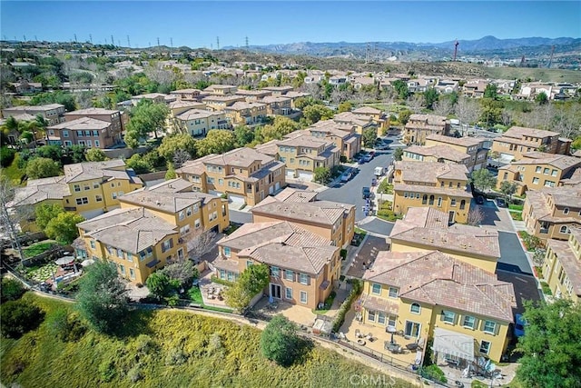 aerial view with a mountain view and a residential view